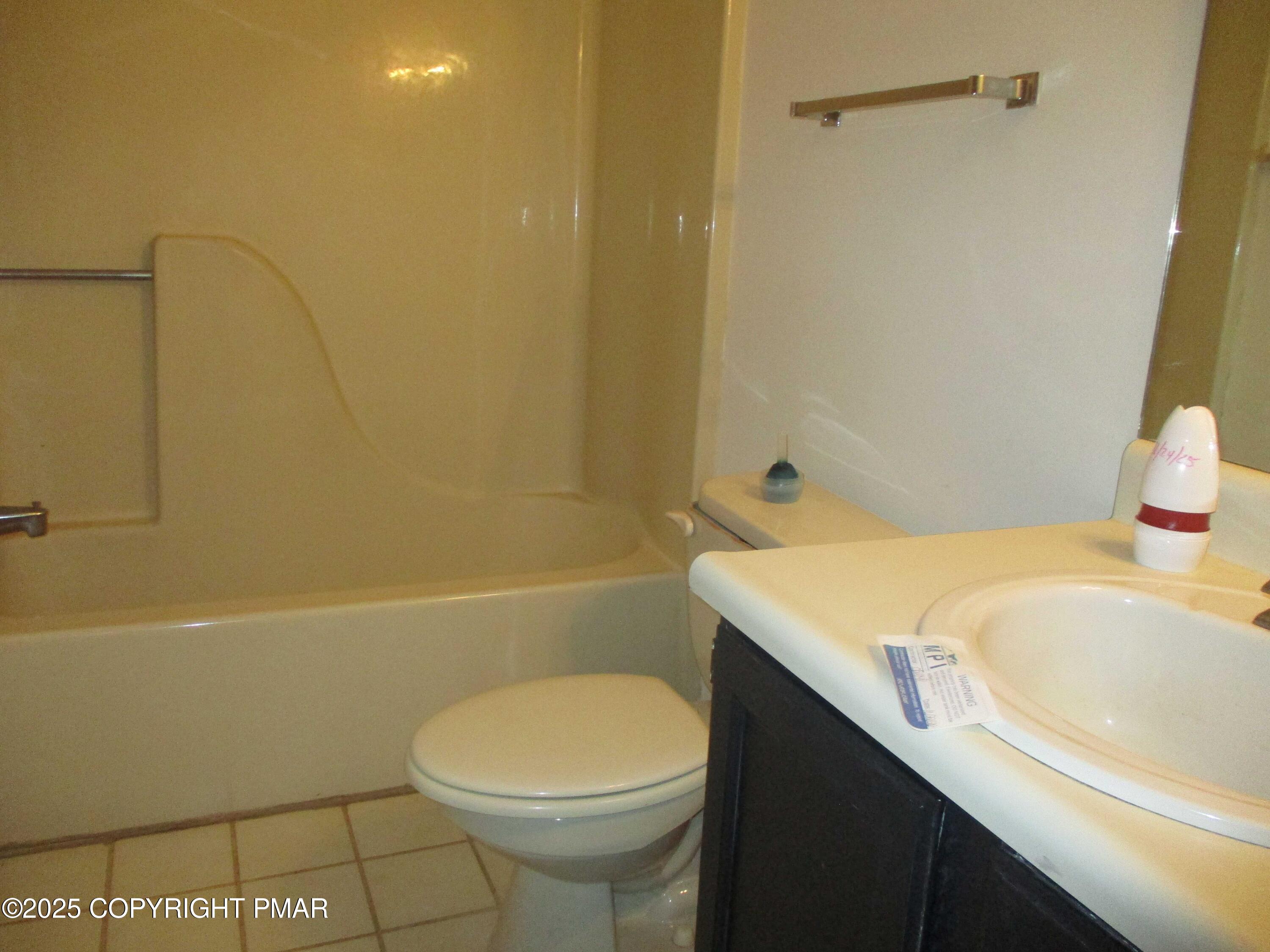 159 Stream Court Bushkill, PA 18324 - Photo 19 of 26 a bathroom with a sink a toilet and shower