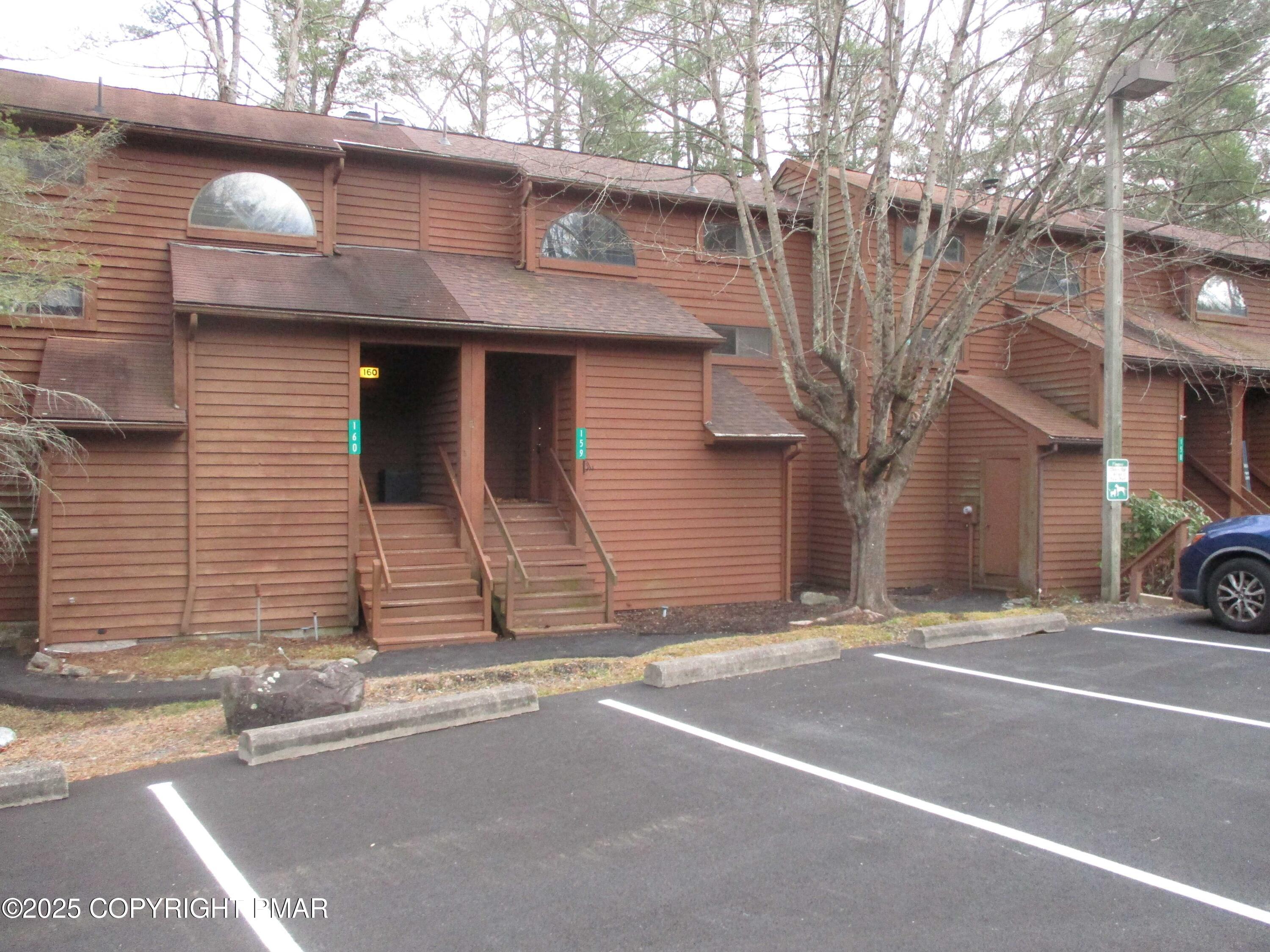 159 Stream Court Bushkill, PA 18324 - Photo 2 of 26 a view of a car park front of a house
