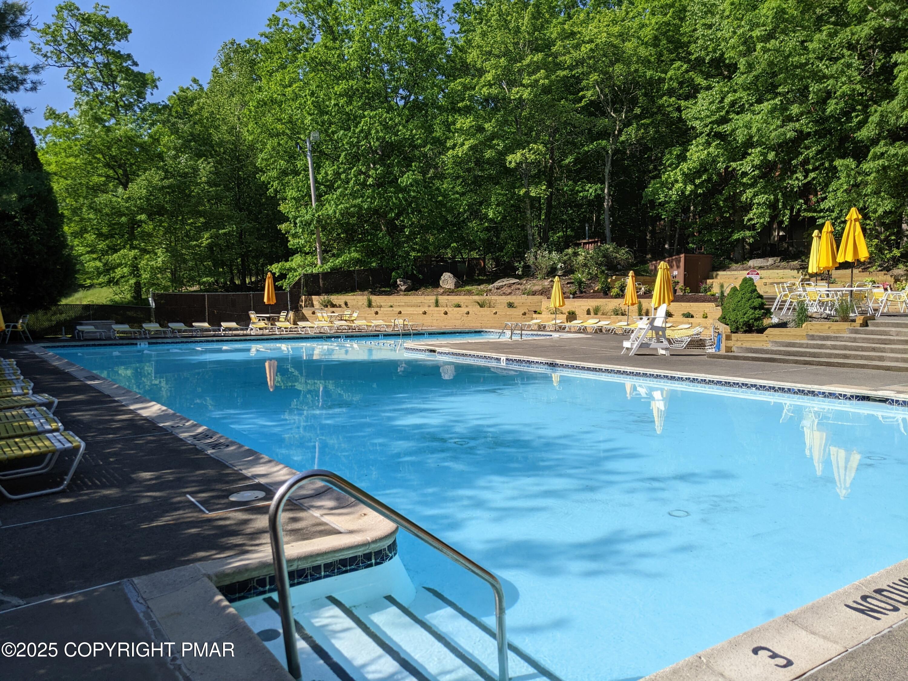 159 Stream Court Bushkill, PA 18324 - Photo 25 of 26 a view of a swimming pool with a patio