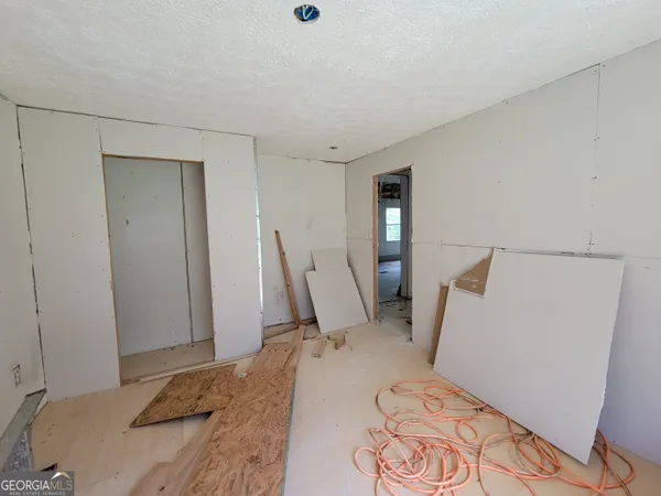 a view of room with window and tv