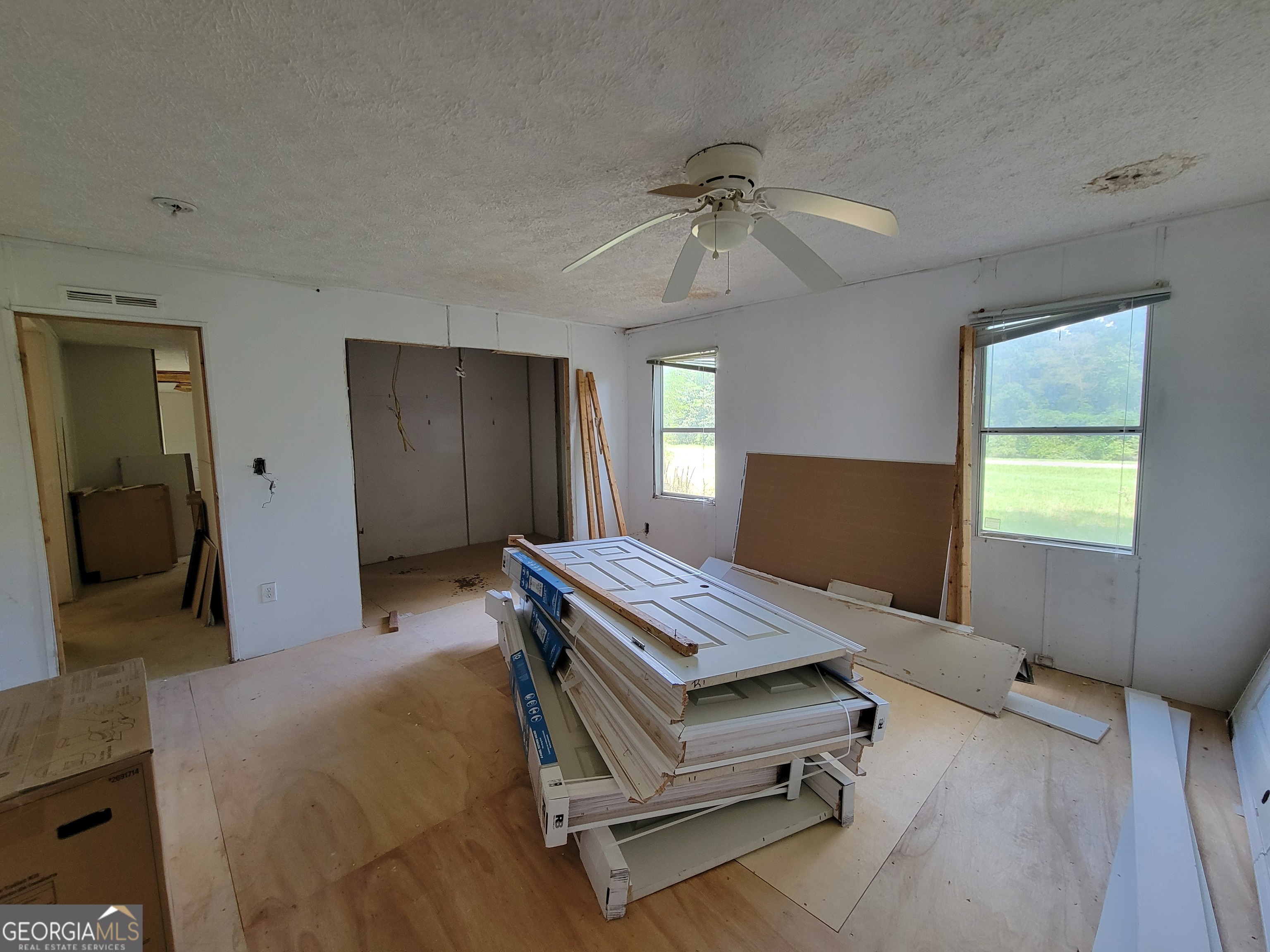 11358 Zebina Road Louisville, GA 30434 - Photo 9 of 22 a bedroom with furniture and a window
