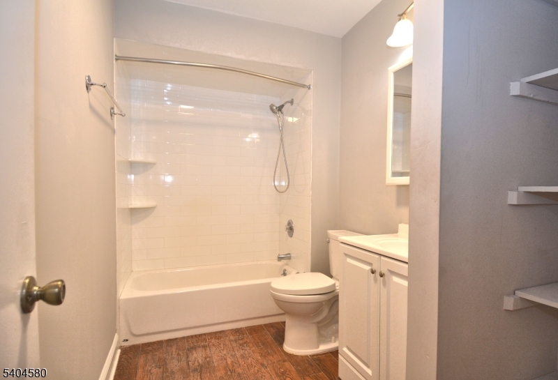 129 Hampton Court Somerset, NJ 08873 - Photo 18 of 25 a bathroom with a toilet and a shower