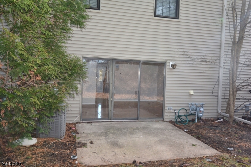 129 Hampton Court Somerset, NJ 08873 - Photo 22 of 25 a view of a house with a yard and garage