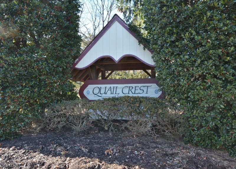 129 Hampton Court Somerset, NJ 08873 - Photo 25 of 25 a sign broad on the side of the road