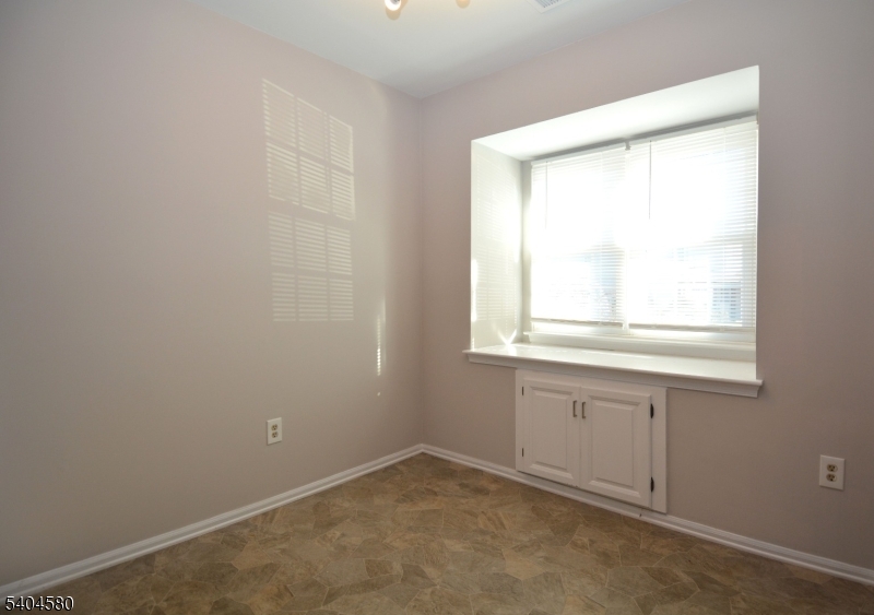 129 Hampton Court Somerset, NJ 08873 - Photo 4 of 25 an empty room with a window