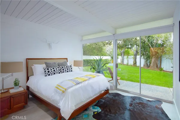 a view of a house with a street