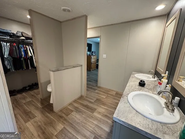 a bathroom with a sink and mirror