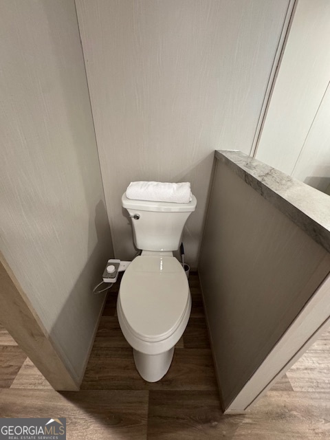 2470 Kitchen Road Dexter, GA 31019 - Photo 20 of 30 a bathroom with a toilet and a sink