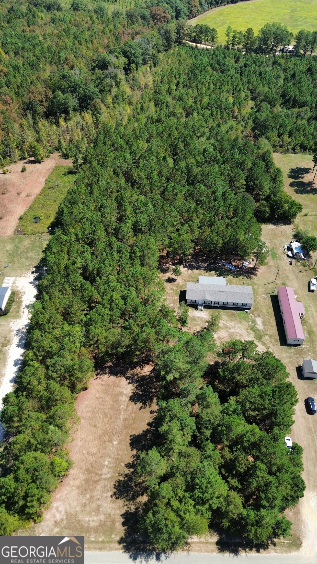 2470 Kitchen Road Dexter, GA 31019 - Photo 29 of 30 an aerial view of residential house with outdoor space