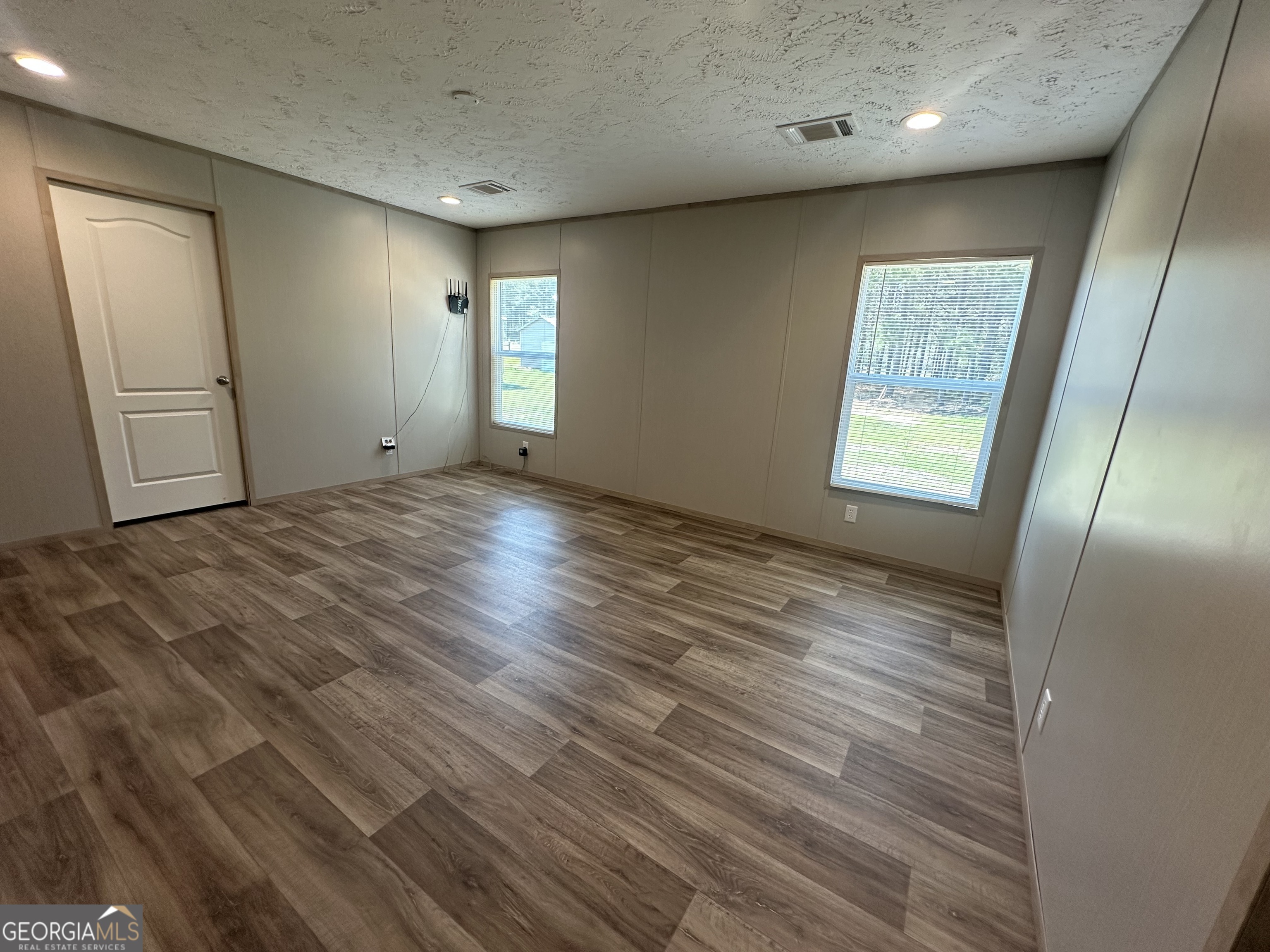 2470 Kitchen Road Dexter, GA 31019 - Photo 33 of 56 a view of an empty room and window