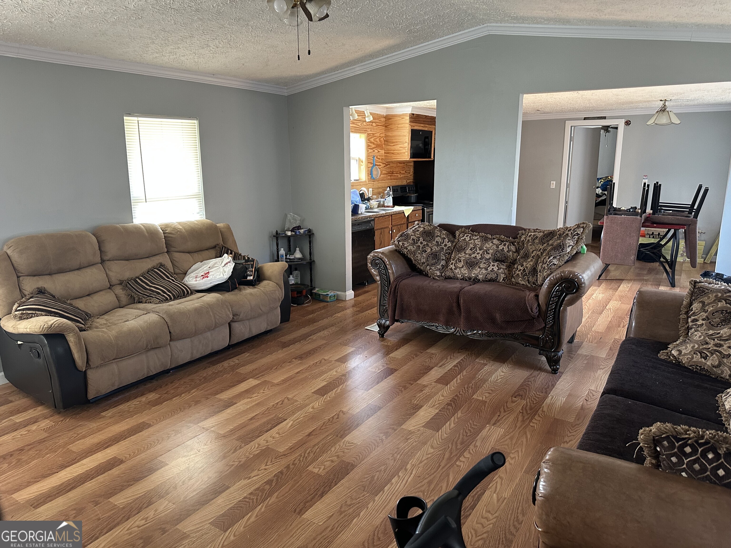 2470 Kitchen Road Dexter, GA 31019 - Photo 50 of 56 a living room with furniture and a couch