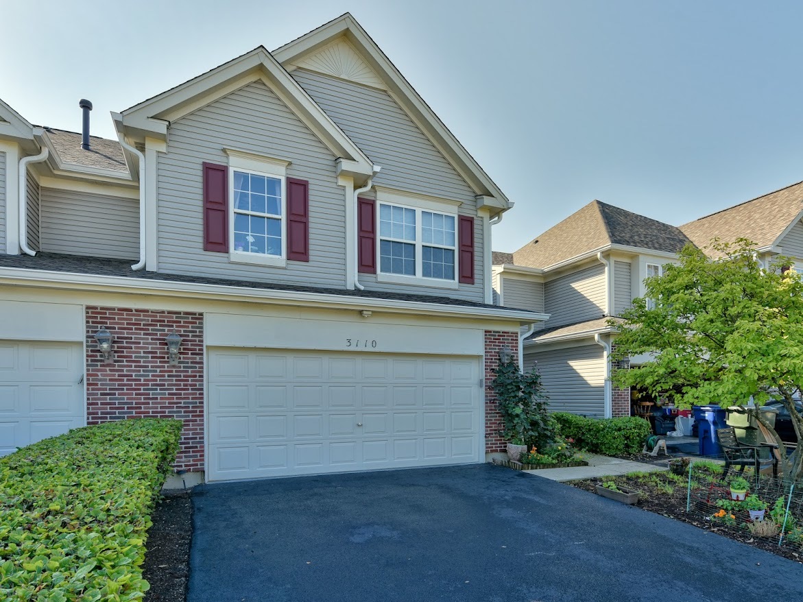 3110 Crystal Rock Road Naperville, IL 60564 - Photo 1 of 27 a view of a house with a yard and plants