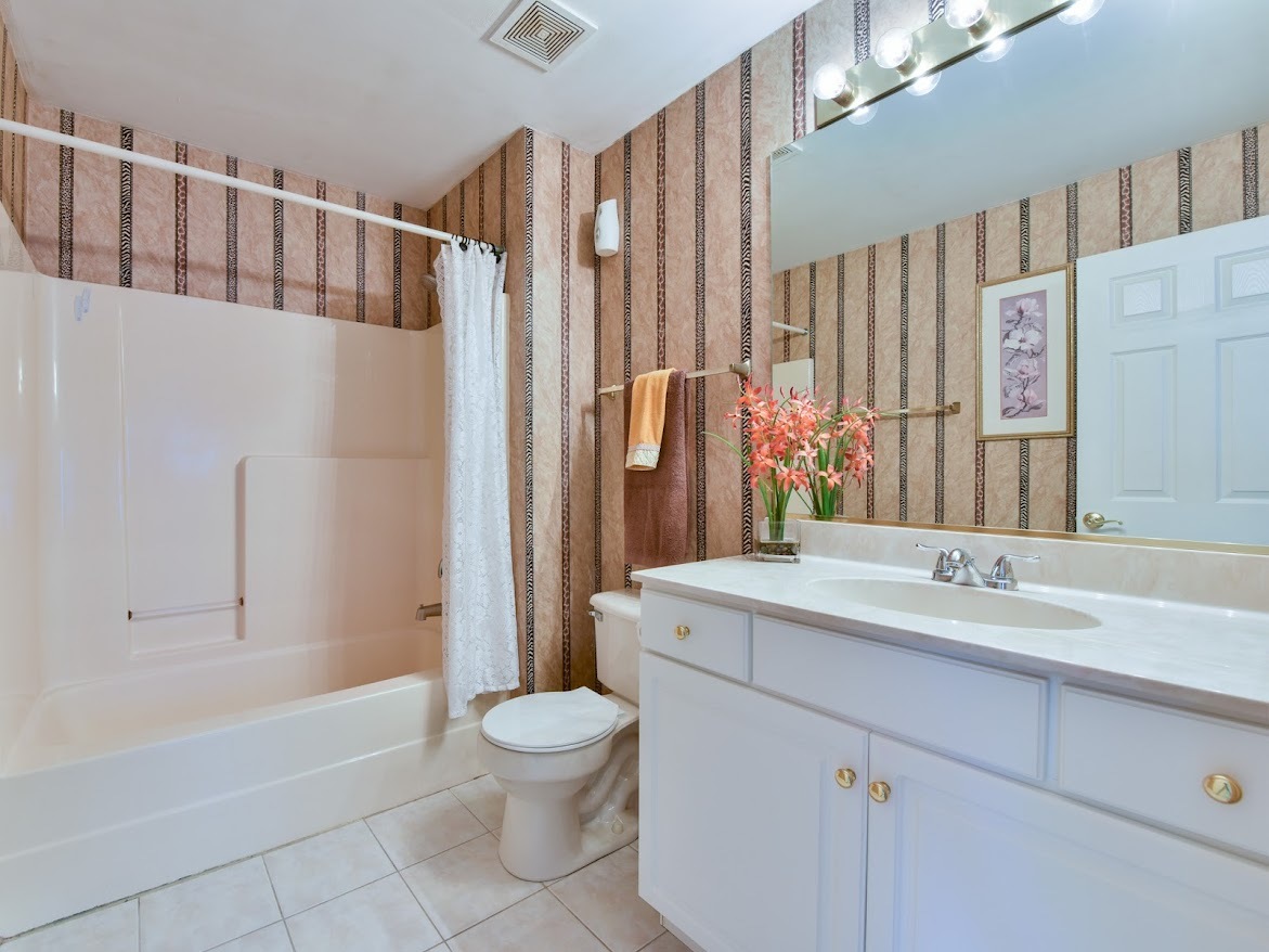 3110 Crystal Rock Road Naperville, IL 60564 - Photo 12 of 27 a bathroom with a sink a toilet and shower