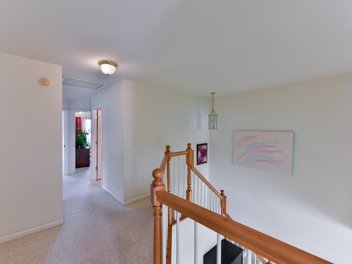 3110 Crystal Rock Road Naperville, IL 60564 - Photo 14 of 27 a view of a hallway with an entryway