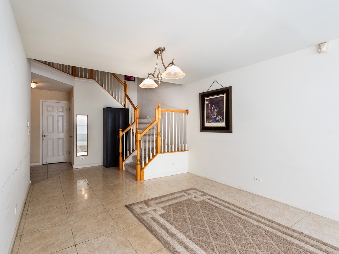 3110 Crystal Rock Road Naperville, IL 60564 - Photo 3 of 27 a view interior of a house with stairs and a living room