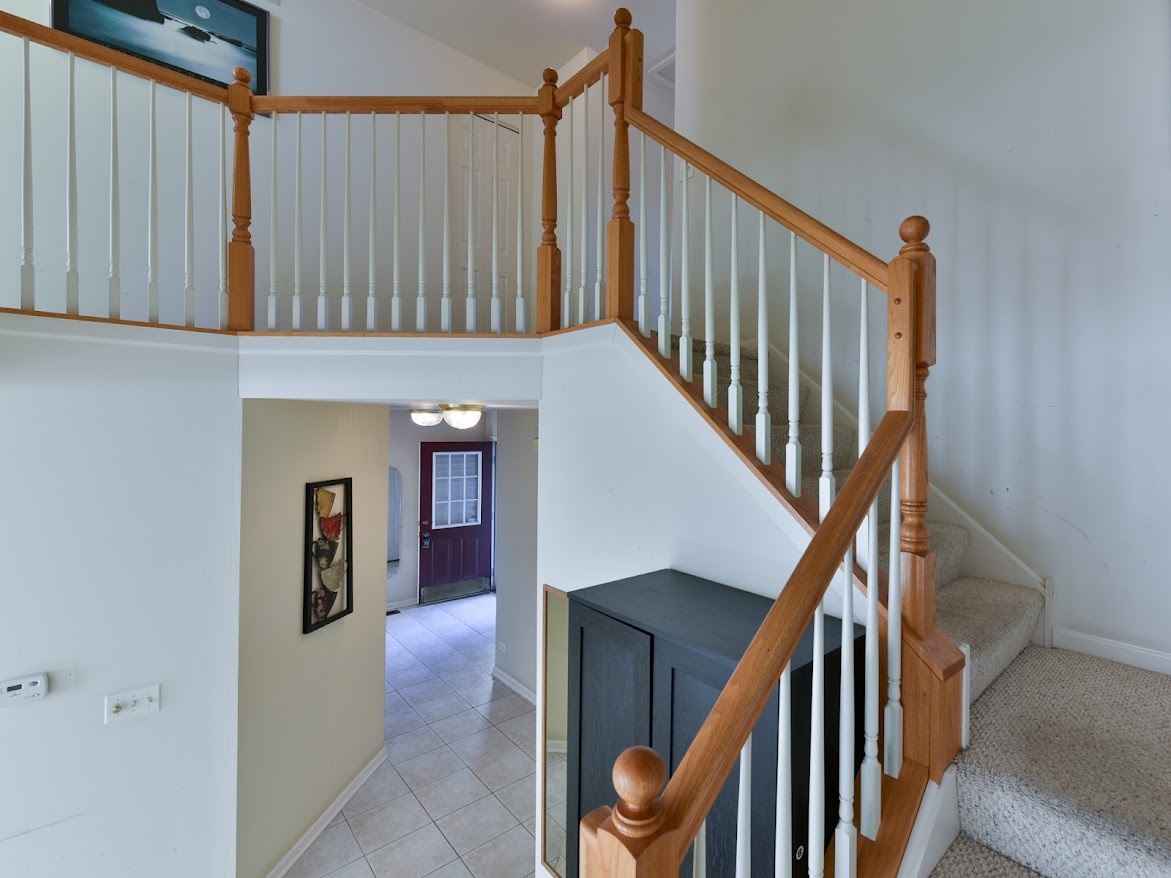 3110 Crystal Rock Road Naperville, IL 60564 - Photo 4 of 27 a view of entryway and hall with wooden floor