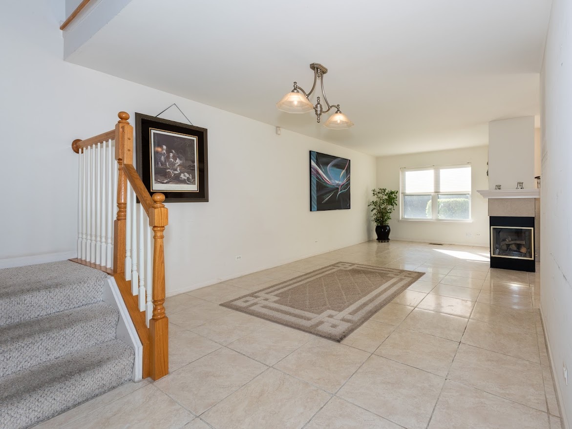 3110 Crystal Rock Road Naperville, IL 60564 - Photo 5 of 27 a view of livingroom with hardwood floor and a ceiling fan