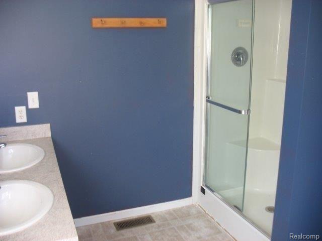 5390 Skelton Road Columbiaville, MI 48421 - Photo 10 of 16 master shower.jpg
