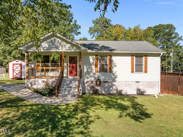 front view of a house with a yard