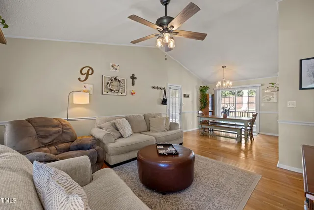 a living room with furniture and a table