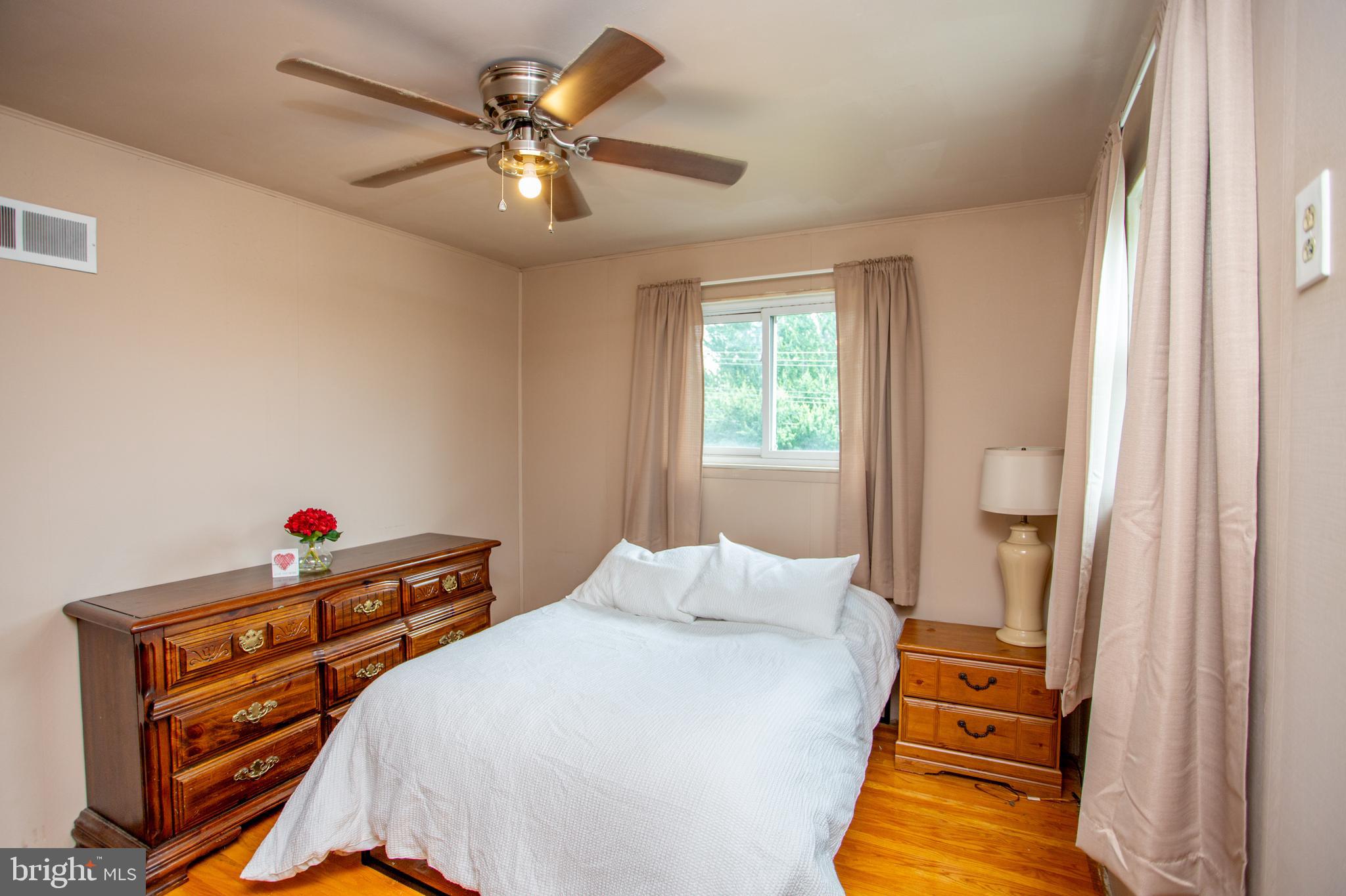 1264 Tulip Road Warminster, PA 18974 - Photo 15 of 21 a bedroom with bed and window