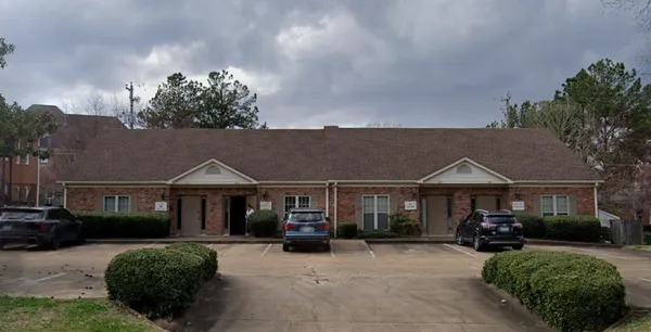 a view of a house with a patio