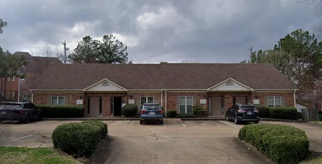 a view of a house with a patio