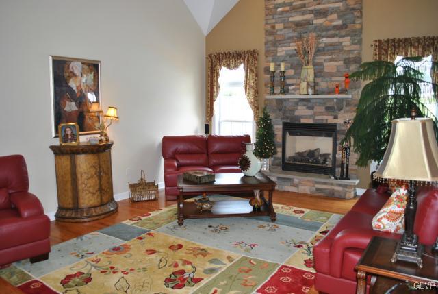 109 Fox Ridge Nazareth, PA 18064 - Photo 15 of 33 a living room with furniture a rug and a fireplace