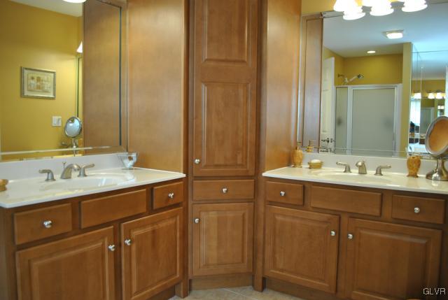 109 Fox Ridge Nazareth, PA 18064 - Photo 23 of 33 a bathroom with a granite countertop sink and a mirror