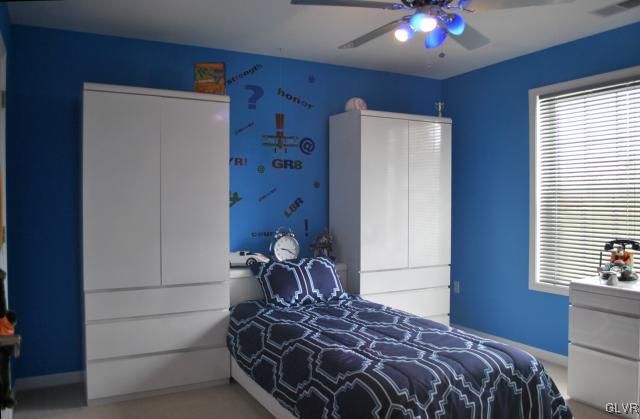 109 Fox Ridge Nazareth, PA 18064 - Photo 27 of 33 a bed sitting in a bedroom next to a window
