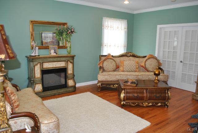 109 Fox Ridge Nazareth, PA 18064 - Photo 8 of 33 a living room with furniture and a fireplace