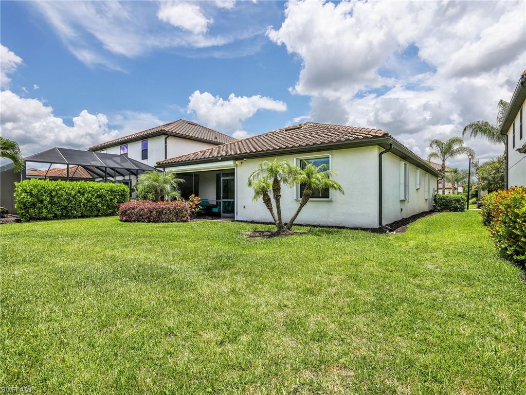 4383 Bismark Way Naples, FL 34119 - Photo 33 of 49 Back Yard with Upgraded Landscaping