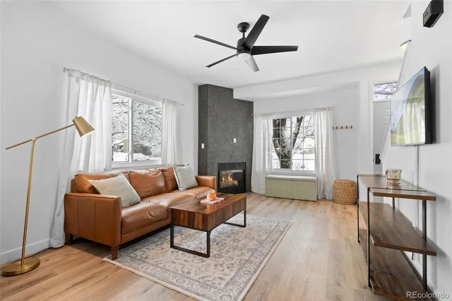 a living room with furniture and a window