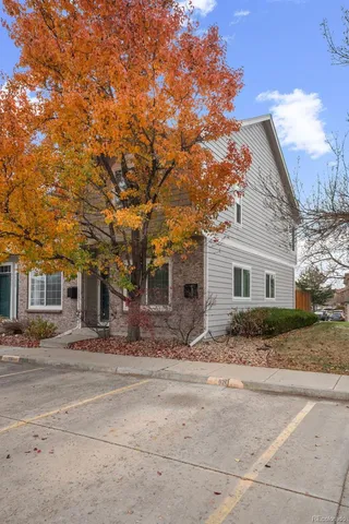 a backyard of a house with large trees