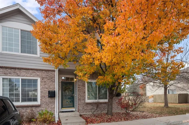 front view of a house with a trees