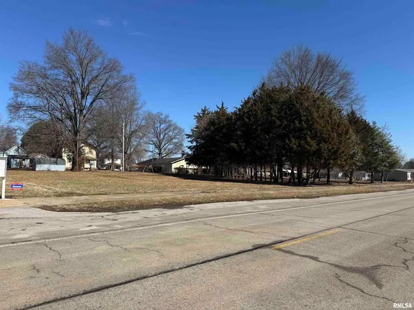 a view of street along with trees