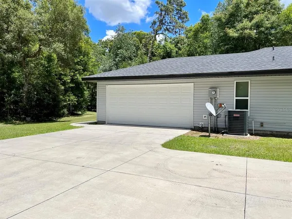 a view of backyard of house