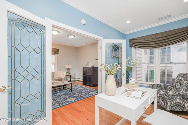 a view of a dining room with furniture window and outside view