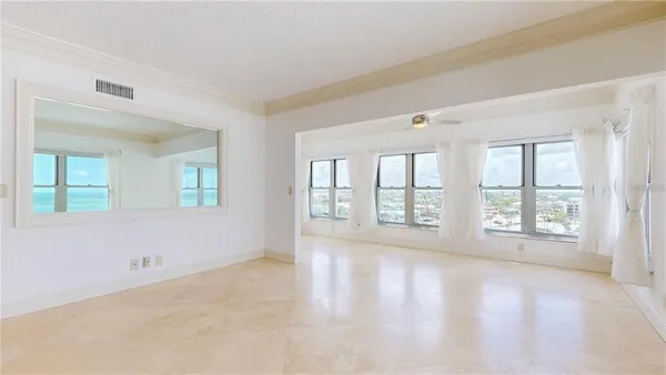 a view of an empty room with a window