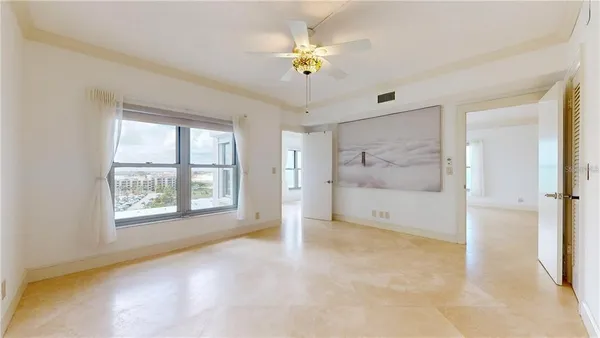 a view of workspace with furniture and windows