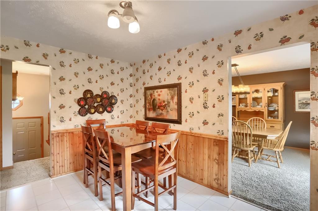 135 Staff Road Slippery Rock, PA 16057 - Photo 12 of 25 a dining room with furniture and wooden floor