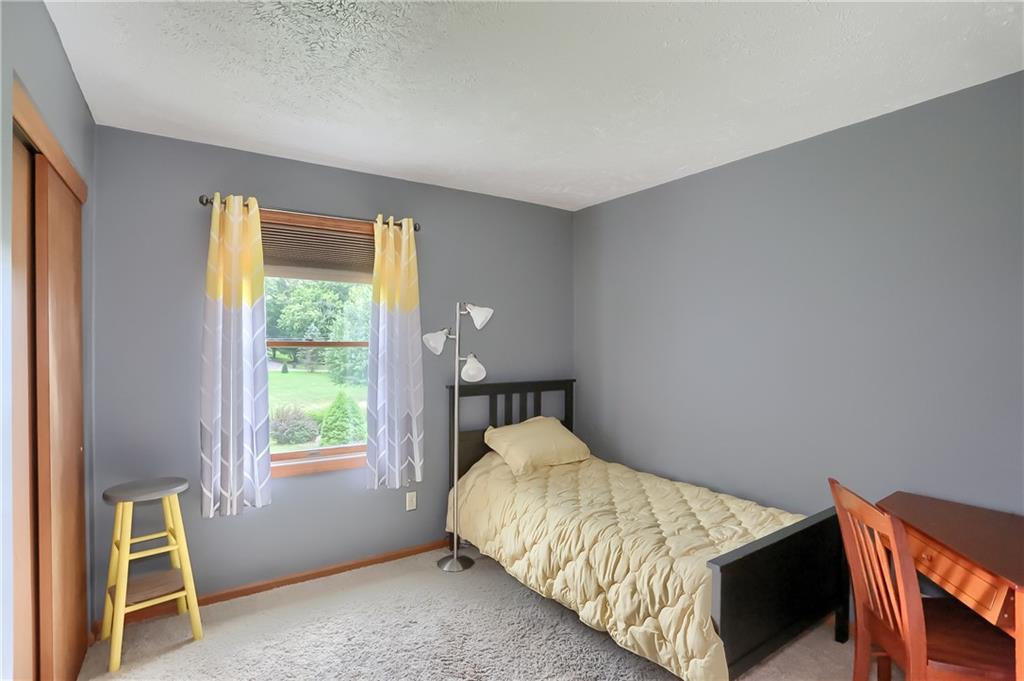135 Staff Road Slippery Rock, PA 16057 - Photo 13 of 25 a bed sitting in a room next to a window