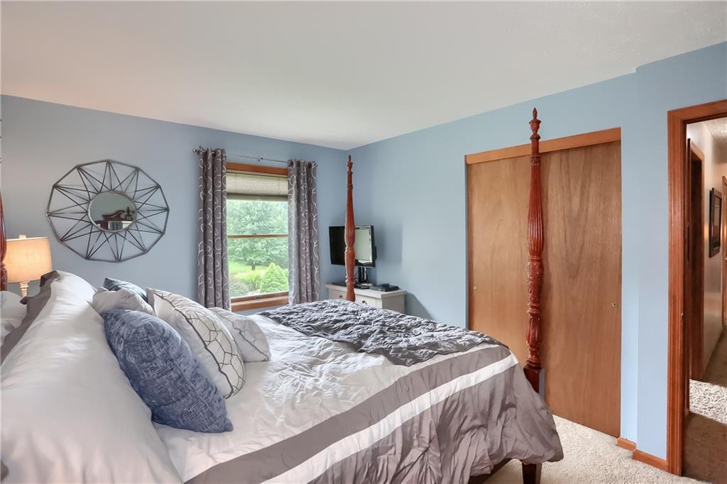 135 Staff Road Slippery Rock, PA 16057 - Photo 14 of 25 a bedroom with a bed and a window