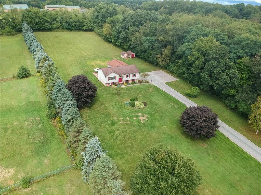 135 Staff Road Slippery Rock, PA 16057 - Photo 2 of 25 a green field with lots of green space