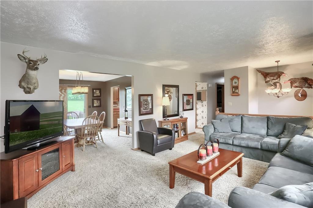 135 Staff Road Slippery Rock, PA 16057 - Photo 5 of 25 a living room with furniture and a flat screen tv