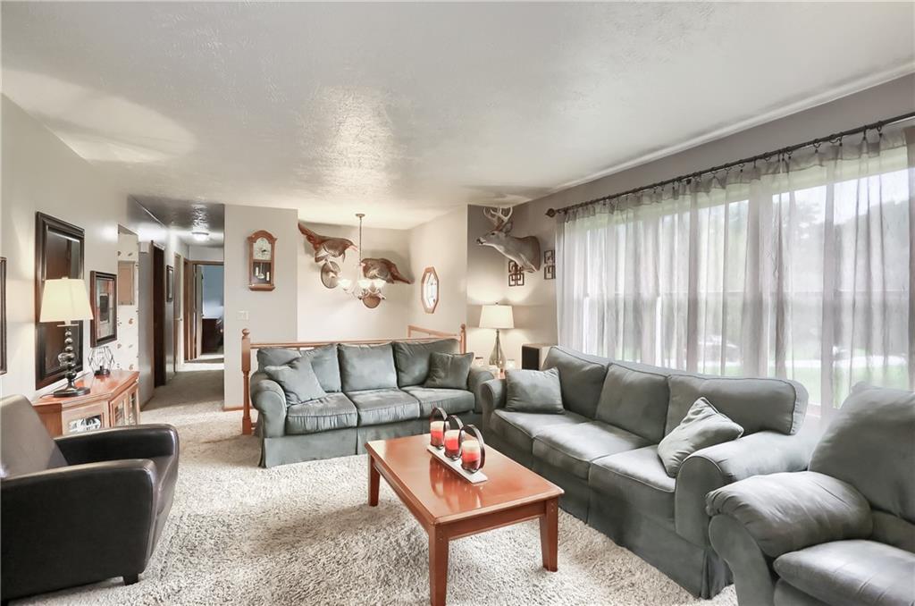 135 Staff Road Slippery Rock, PA 16057 - Photo 6 of 25 a living room with furniture and a large window