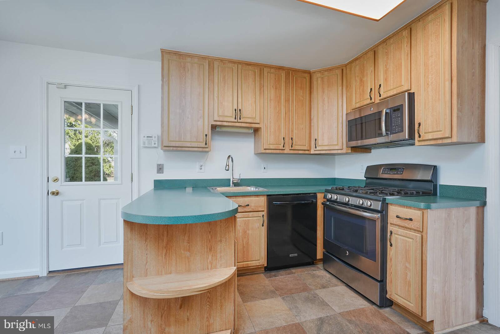 12517 Kuhl Road Silver Spring, MD 20902 - Photo 12 of 55 Door to carport