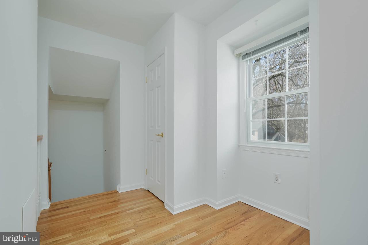 12517 Kuhl Road Silver Spring, MD 20902 - Photo 25 of 55 Bright upper hallway with 3 storage closets