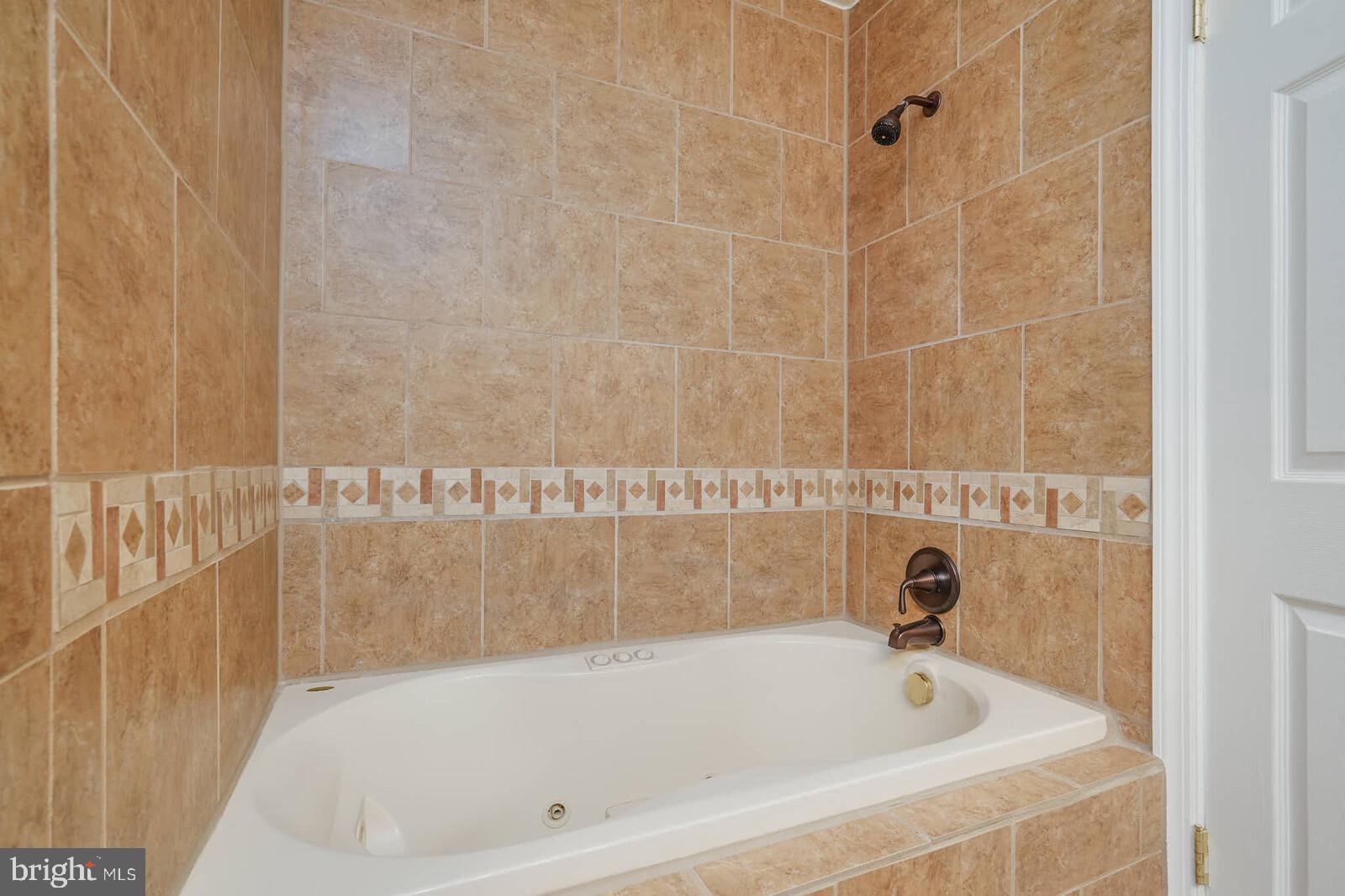 12517 Kuhl Road Silver Spring, MD 20902 - Photo 28 of 55 Jetted soaking tub/shower for uppermost level