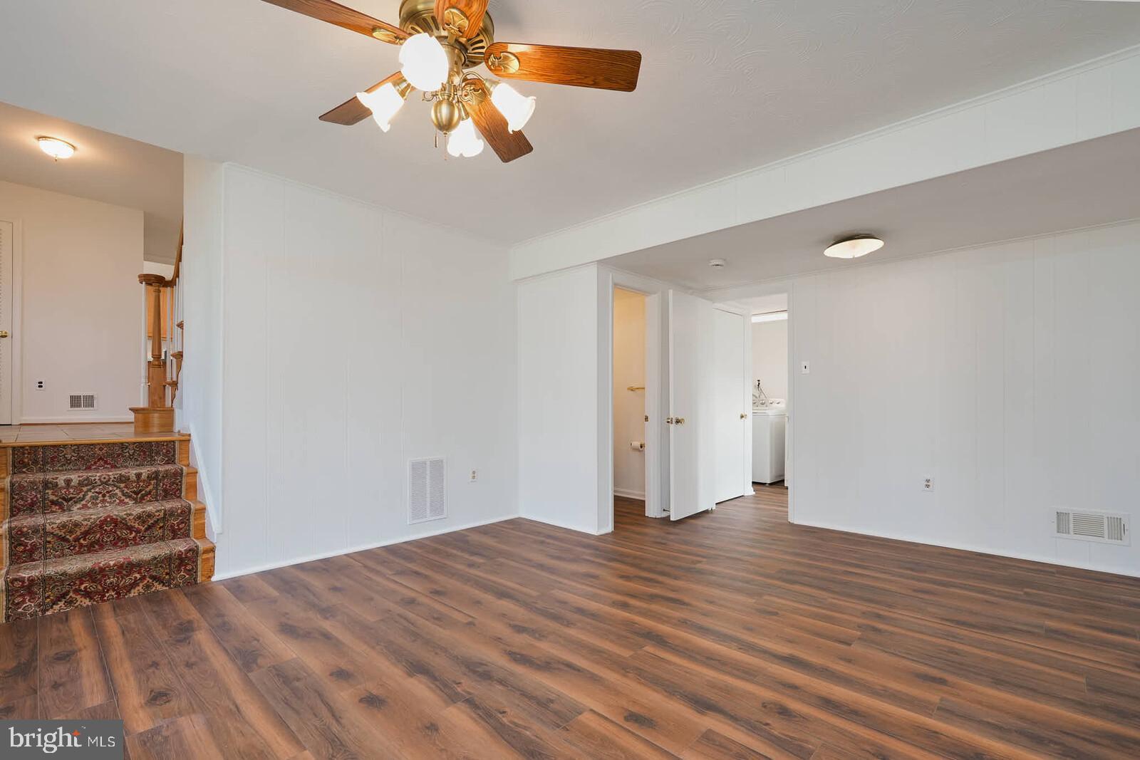 12517 Kuhl Road Silver Spring, MD 20902 - Photo 33 of 55 Family room toward stairs to foyer